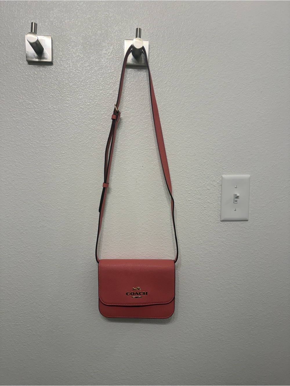 COACH Pebbled Leather Crossbody Bag in Coral Pink